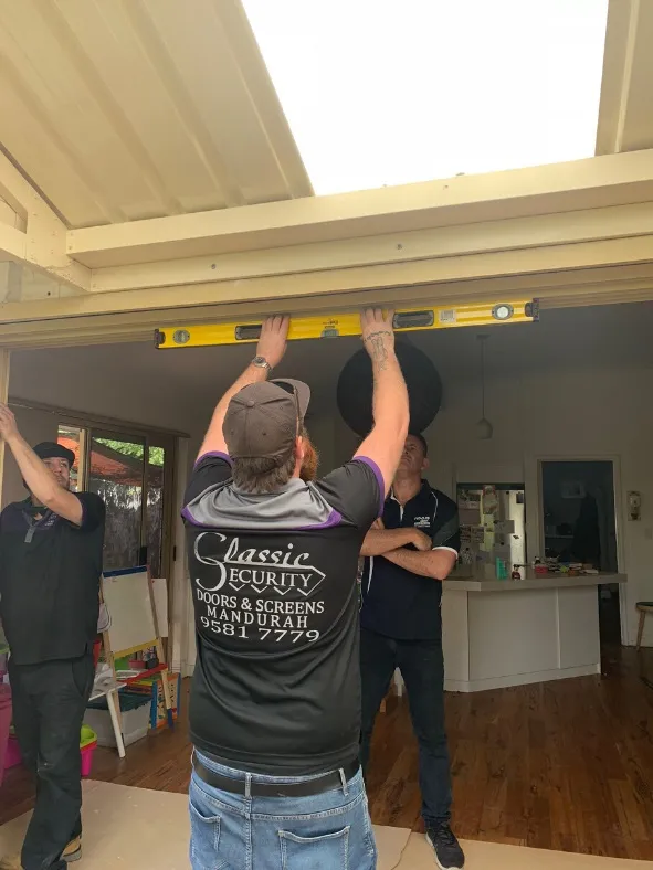 Glass door track work — Classic Security Mandurah